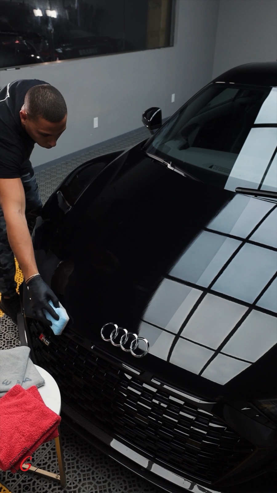 Black Audi R8 receiving a ceramic coating in the G Wraps studio, Irvine
