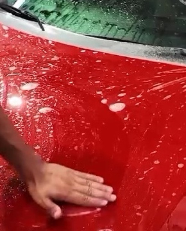 Clear paint protection film hand-installed on a red Ferrari 458 hood by G Wraps OC, Irvine