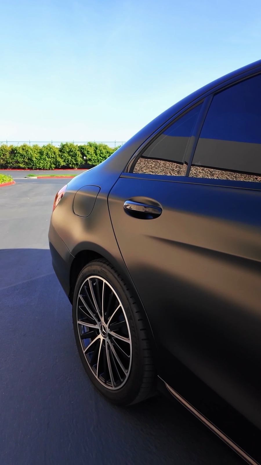 Mercedes C300 in a satin black full vinyl wrap by G Wraps OC, Irvine